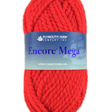 A red skein of Plymouth Encore Mega yarn