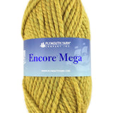 A green skein of Plymouth Encore Mega yarn