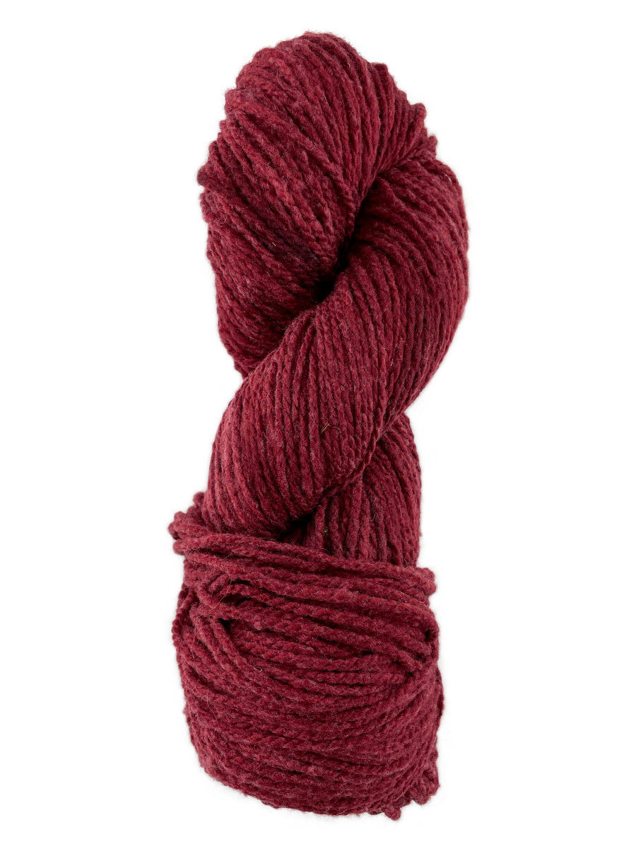 A red skein of Mountain Meadow Wool Laramie yarn