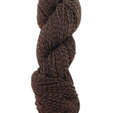 A brown marled skein of Mountain Meadow Wool Cora yarn
