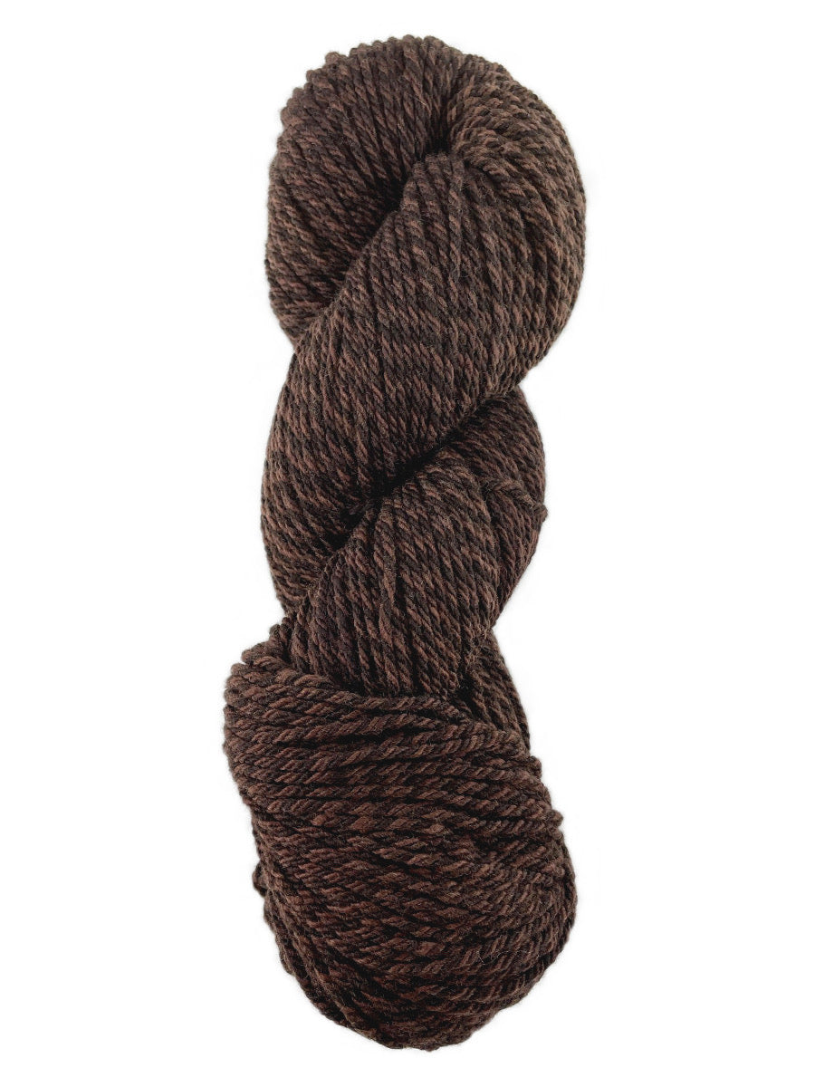 A brown marled skein of Mountain Meadow Wool Cora yarn