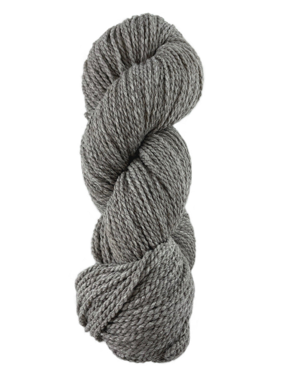 A medium grey skein of Mountain Meadow Wool Laramie Natural yarn