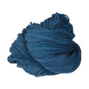 A spruce colored hank of the Mountain Meadow Wool Alpine collection.