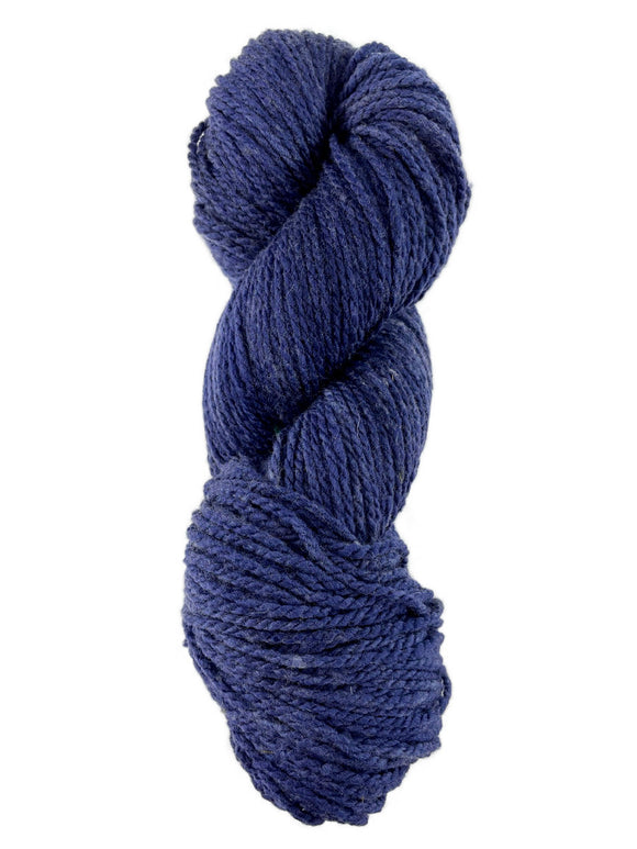 A blue skein of Mountain Meadow Wool Laramie yarn