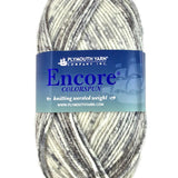 A grey mix of Plymouth Encore Colorspun yarn