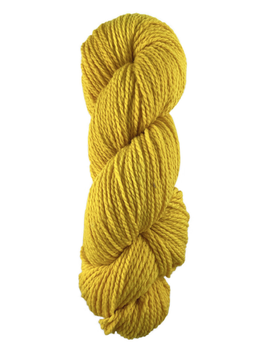 A yellow skein of Mountain Meadow Wool Laramie yarn