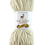 A white skein of Plymouth Baby Alpaca Grande yarn