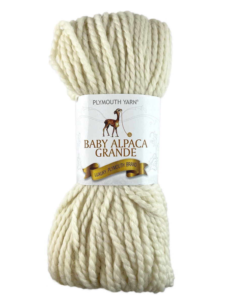 A white skein of Plymouth Baby Alpaca Grande yarn