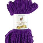 A purple skein of Plymouth Baby Alpaca Grande Yarn