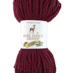A red skein of Plymouth Baby Alpaca Grande yarn