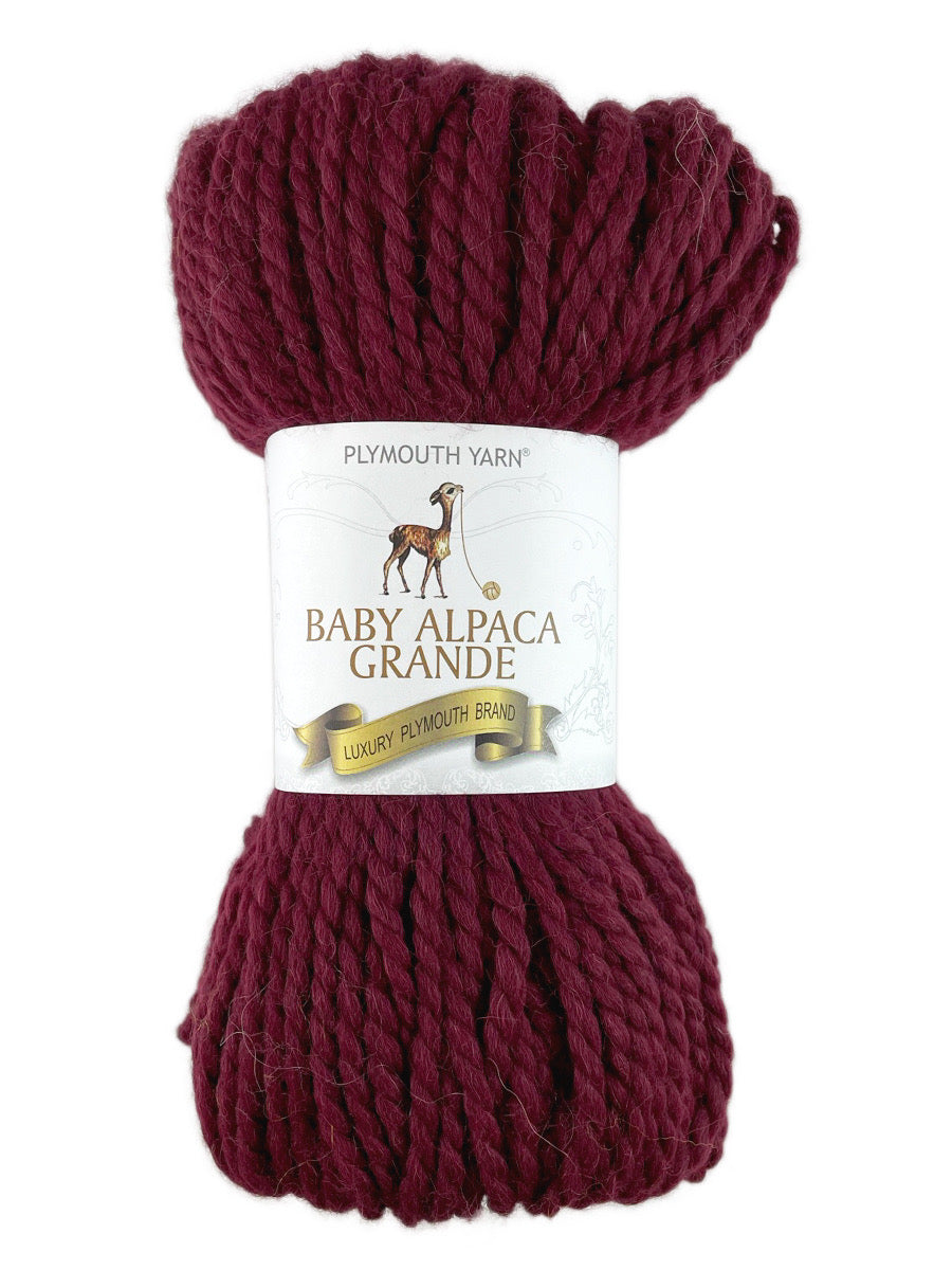 A red skein of Plymouth Baby Alpaca Grande yarn