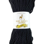 A black skein of Plymouth Baby Alpaca Grande yarn