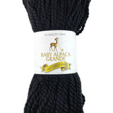 A black skein of Plymouth Baby Alpaca Grande yarn