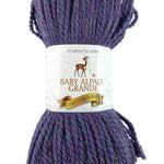 A blue mix skein of Plymouth Baby Alpaca Grande yarn