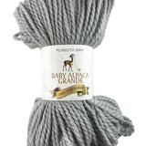 A grey skein of Plymouth Baby Alpaca Grande yarn
