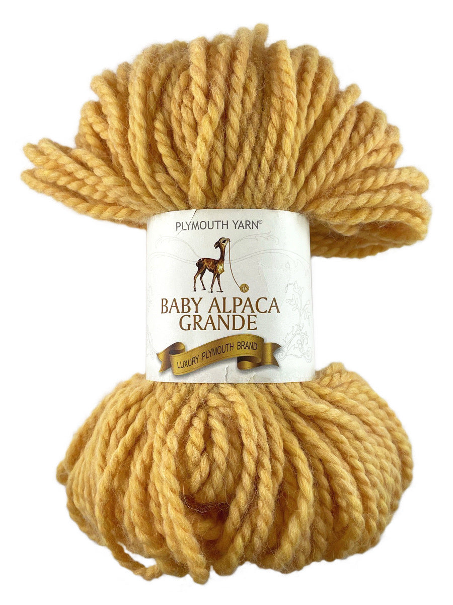 A yellow skein of Plymouth Baby Alpaca Grande yarn