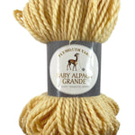 A yellow skein of Plymouth Baby Alpaca Grande yarn