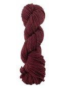 A red skein of Mountain Meadow Wool Mountain Down yarn