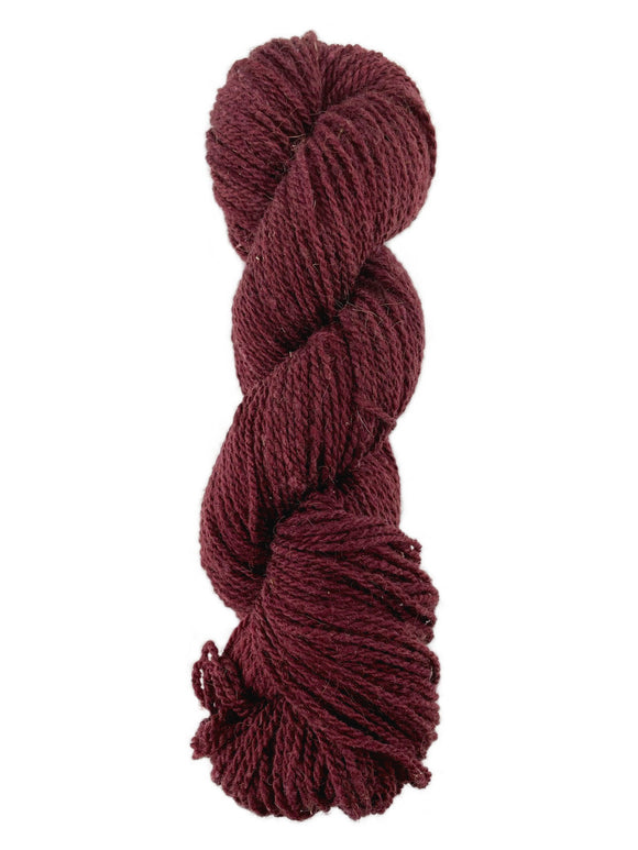A red skein of Mountain Meadow Wool Mountain Down yarn