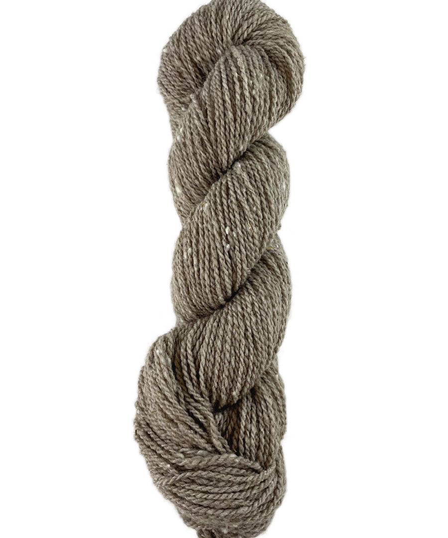 A natural skein of Mountain Meadow Wool Mountain Down yarn