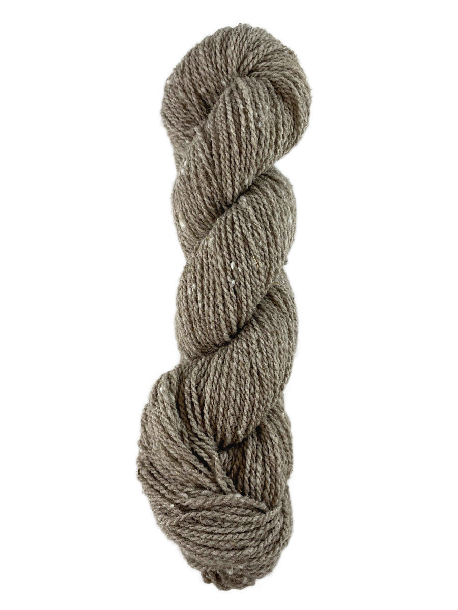 A natural skein of Mountain Meadow Wool Mountain Down yarn