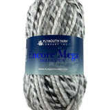 A white and grey skein of Plymouth Encore Mega Colorspun yarn