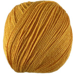 An orange skein of Universal Bamboo Pop yarn