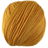 An orange skein of Universal Bamboo Pop yarn