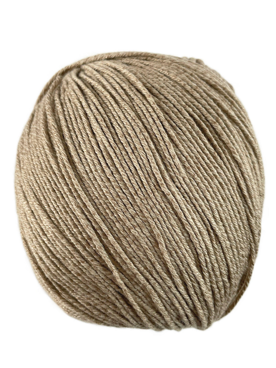 A tan skein of Universal Bamboo Pop yarn