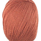 An orange skein of Universal Bamboo Pop yarn