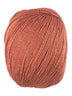 An orange skein of Universal Bamboo Pop yarn