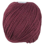 A red skein of Universal Bamboo Pop yarn