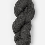 Skein of Blue Sky Fibers Woolstok yarn in the color dark heathered grey