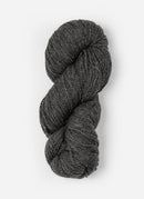Skein of Blue Sky Fibers Woolstok yarn in the color dark heathered grey