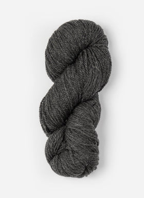 Skein of Blue Sky Fibers Woolstok yarn in the color dark heathered grey