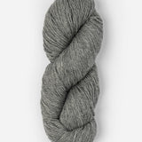 Skein of Blue Sky Fibers Woolstok yarn in the color light heathered grey
