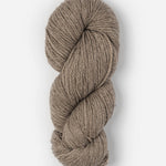 Skein of Blue Sky Fibers Woolstok yarn in the color light khaki brown