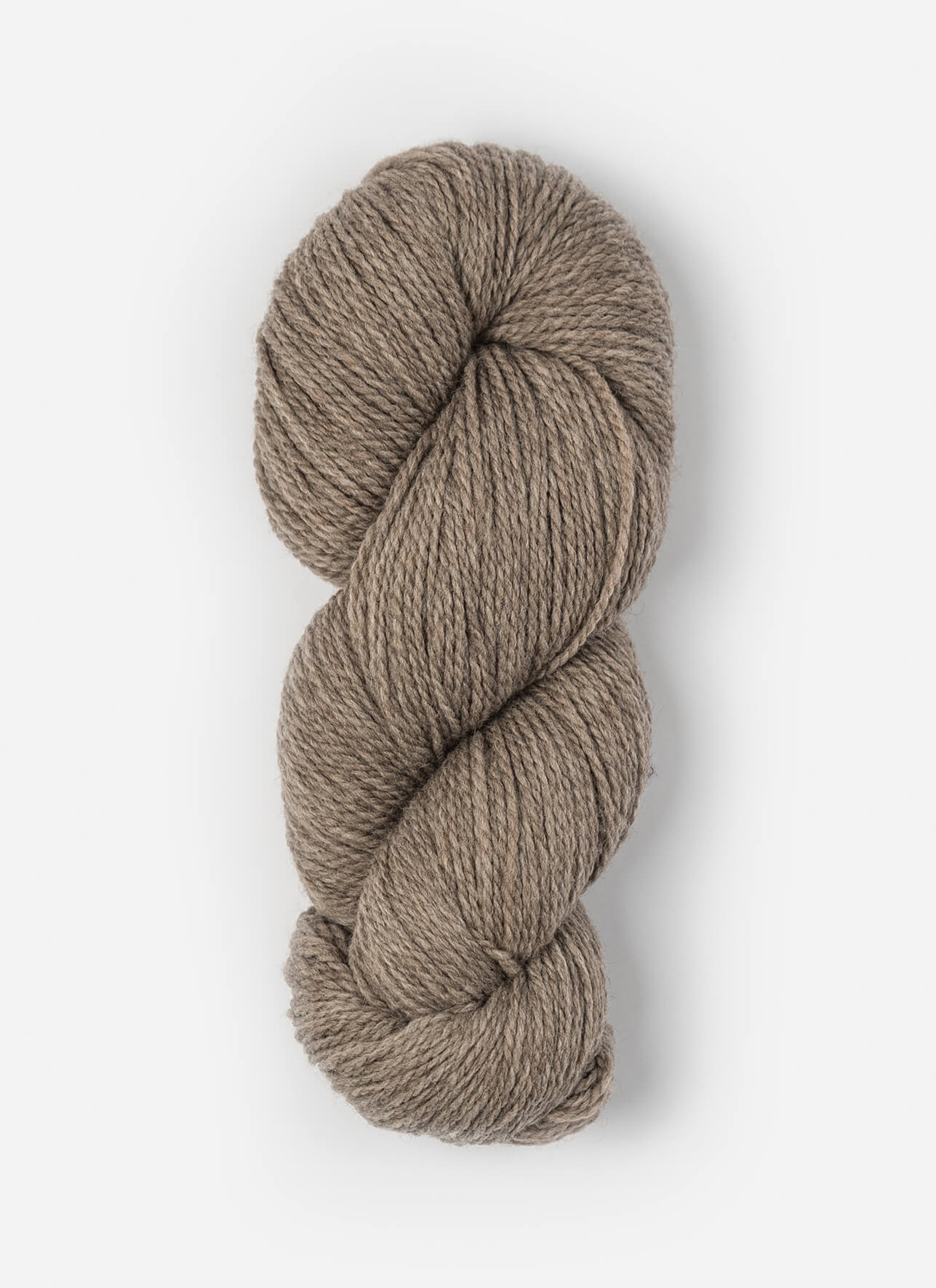Skein of Blue Sky Fibers Woolstok yarn in the color light khaki brown