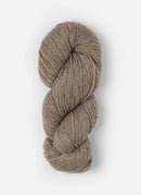 Skein of Blue Sky Fibers Woolstok yarn in the color light khaki brown