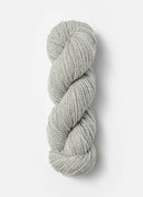 Skein of Blue Sky Fibers Woolstok yarn in the color light grey