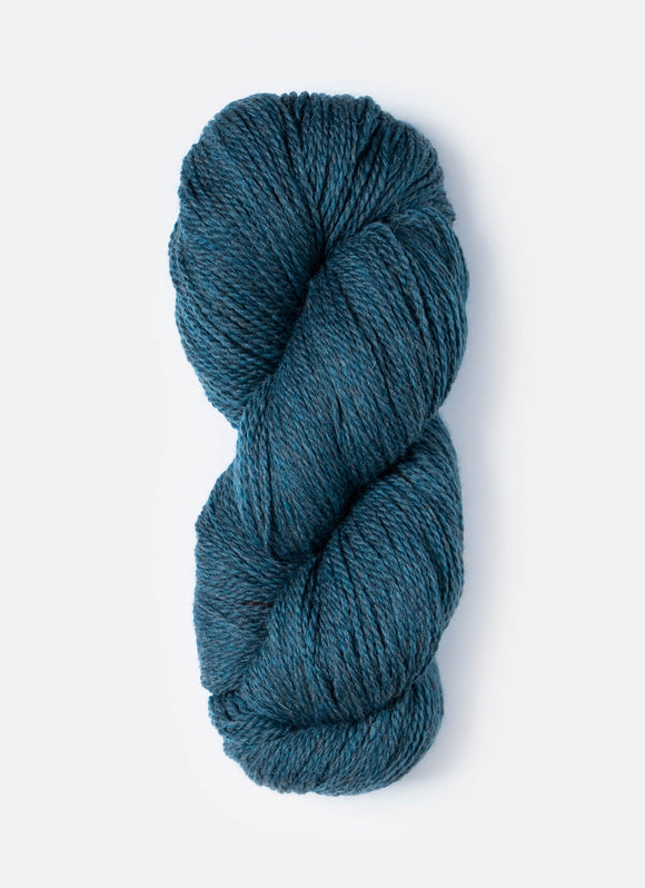 Skein of Blue Sky Fibers Woolstok yarn in the color blue