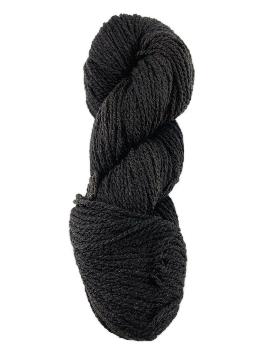 A black skein of Mountain Meadow Wool Laramie yarn