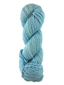 A blue skein of Mountain Meadow Wool Laramie yarn