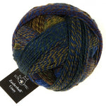Schoppel Wolle Crazy Zauberball yarn color blue, green, and tan