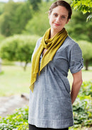 A woman wearing a knitted scarf