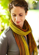A woman wearing a knitted scarf