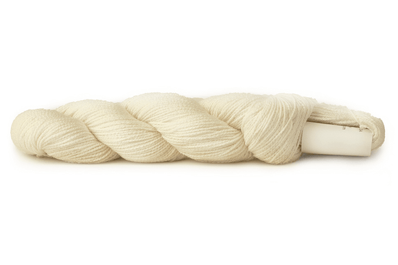 A photo of a white hank of CoBaSi sock yarn.