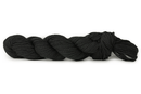 A photo of a black hank of CoBaSi sock yarn.