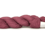 A photo of a framboise colored hank of CoBaSi sock yarn.