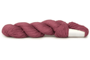 A photo of a framboise colored hank of CoBaSi sock yarn.
